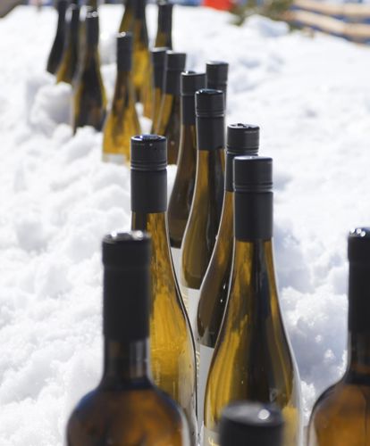 Wine bottles on the snow